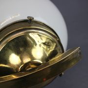 Pair of Art Deco wall sconces in brass and opaline glass, Europe, 1930s