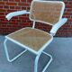 Cesca Chair model with armrest in white