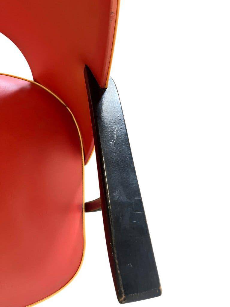 Vintage red rockabilly chair with armrest