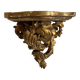 Antique wall console in wood and gilded stucco.