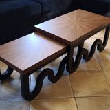 Nest of coffee tables in lacquer and rosewood veneer.
