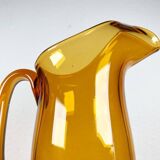 Amber glass carafe from the mid-century German Jagdhaus series and drinking glasses by Wilhelm Braun-Feldweg for Hirschberg, 1960s, set of 7.