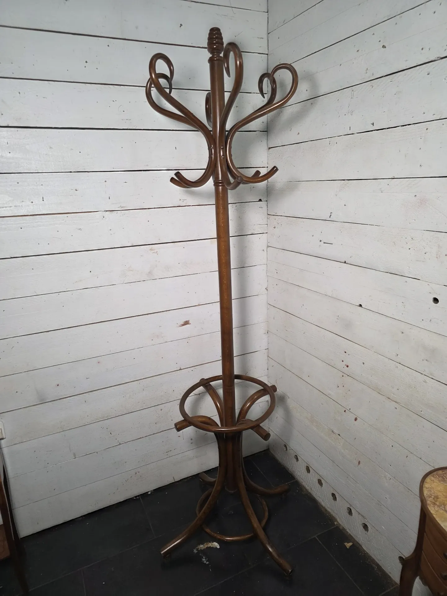 Curved antique wooden parrot