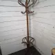 Curved antique wooden parrot