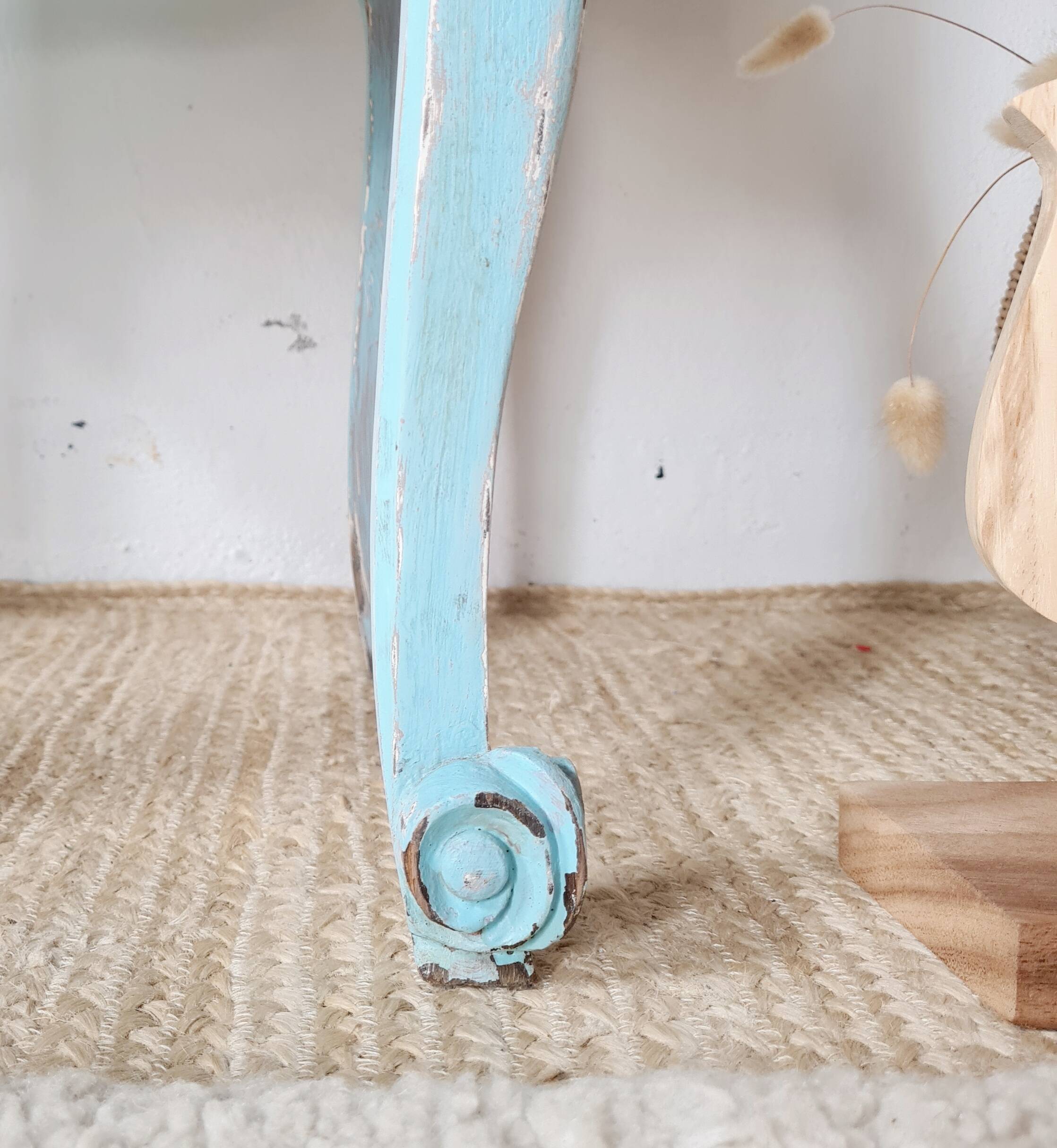 Small vintage bedside table in azure blue patina.