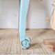 Small vintage bedside table in azure blue patina.