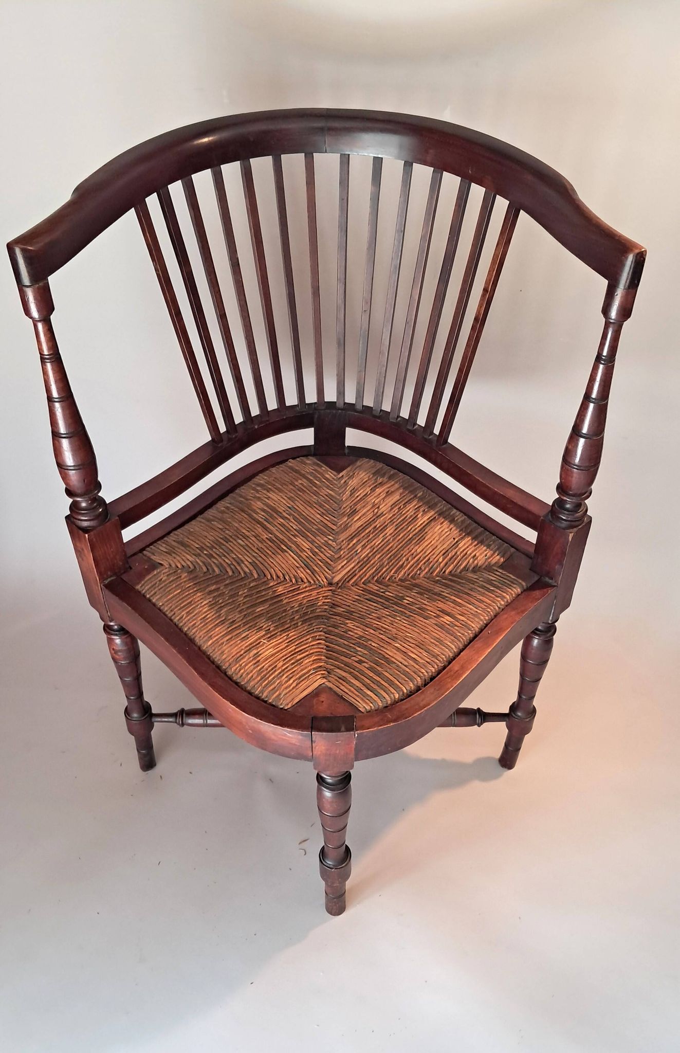 Pair of wicker corner armchairs in mahogany, Jugendstil, 1900.
