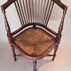 Paire de fauteuils d'angle paillés Jungerstil en acajou 1900.