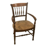 Curved armchair in wood and straw