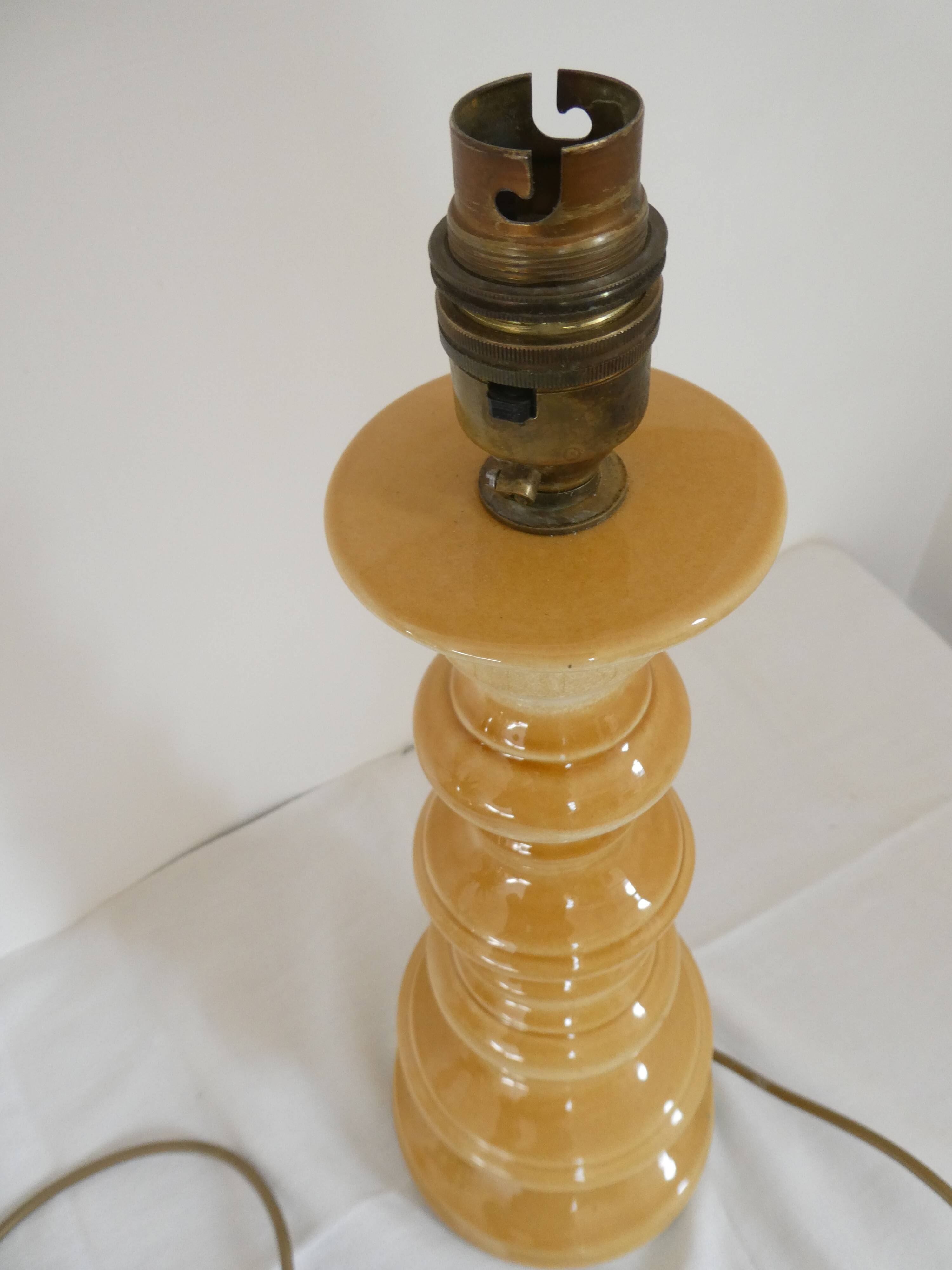 Large baluster-shaped lamp base in yellow and beige ceramic from the 1960s.