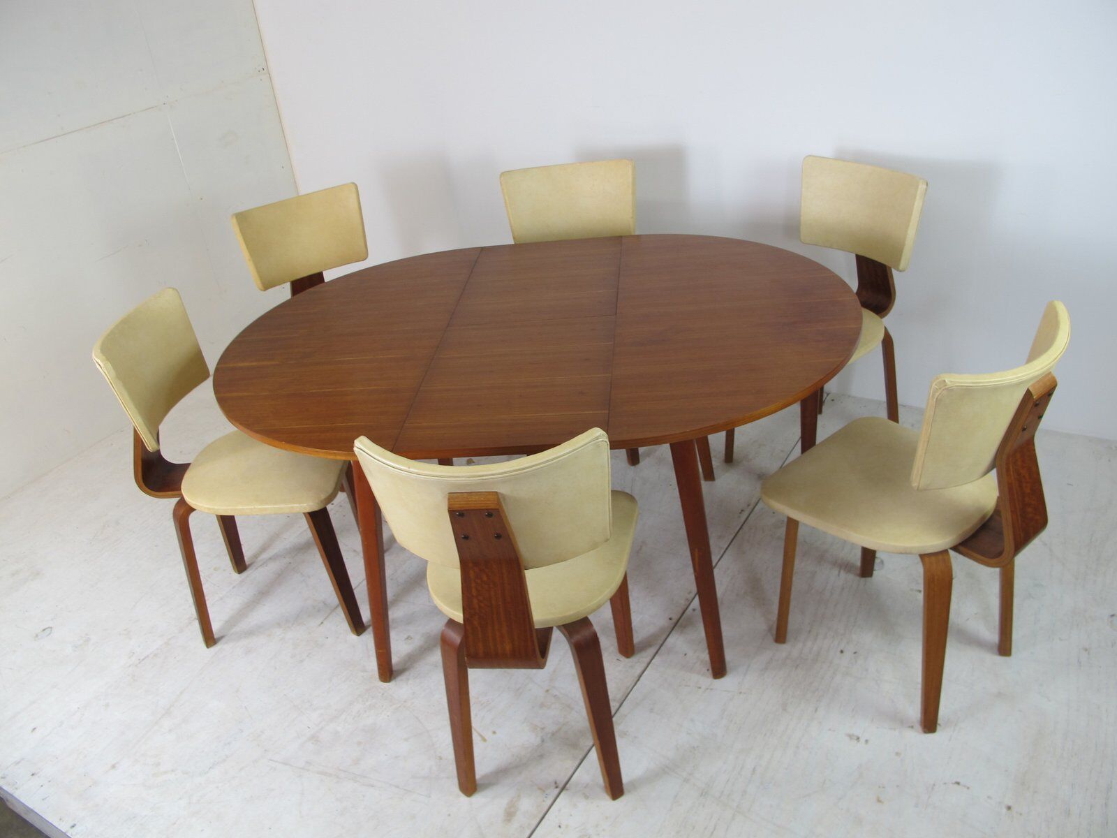 Set of 6 mid-century modernist lounge chairs in plywood - extension table by Cor Alons for Gouda den Boer