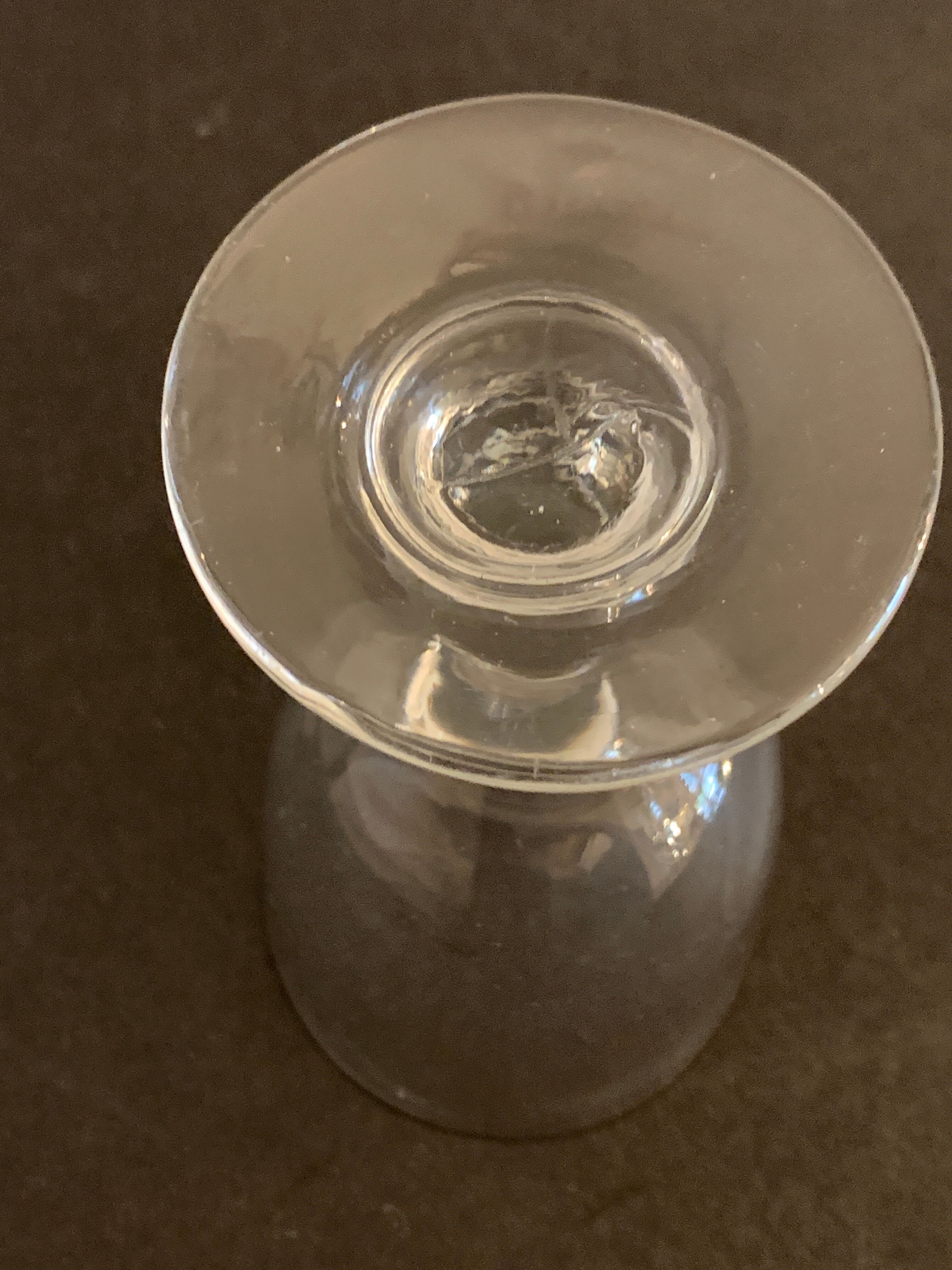 7 antique blown foot glasses