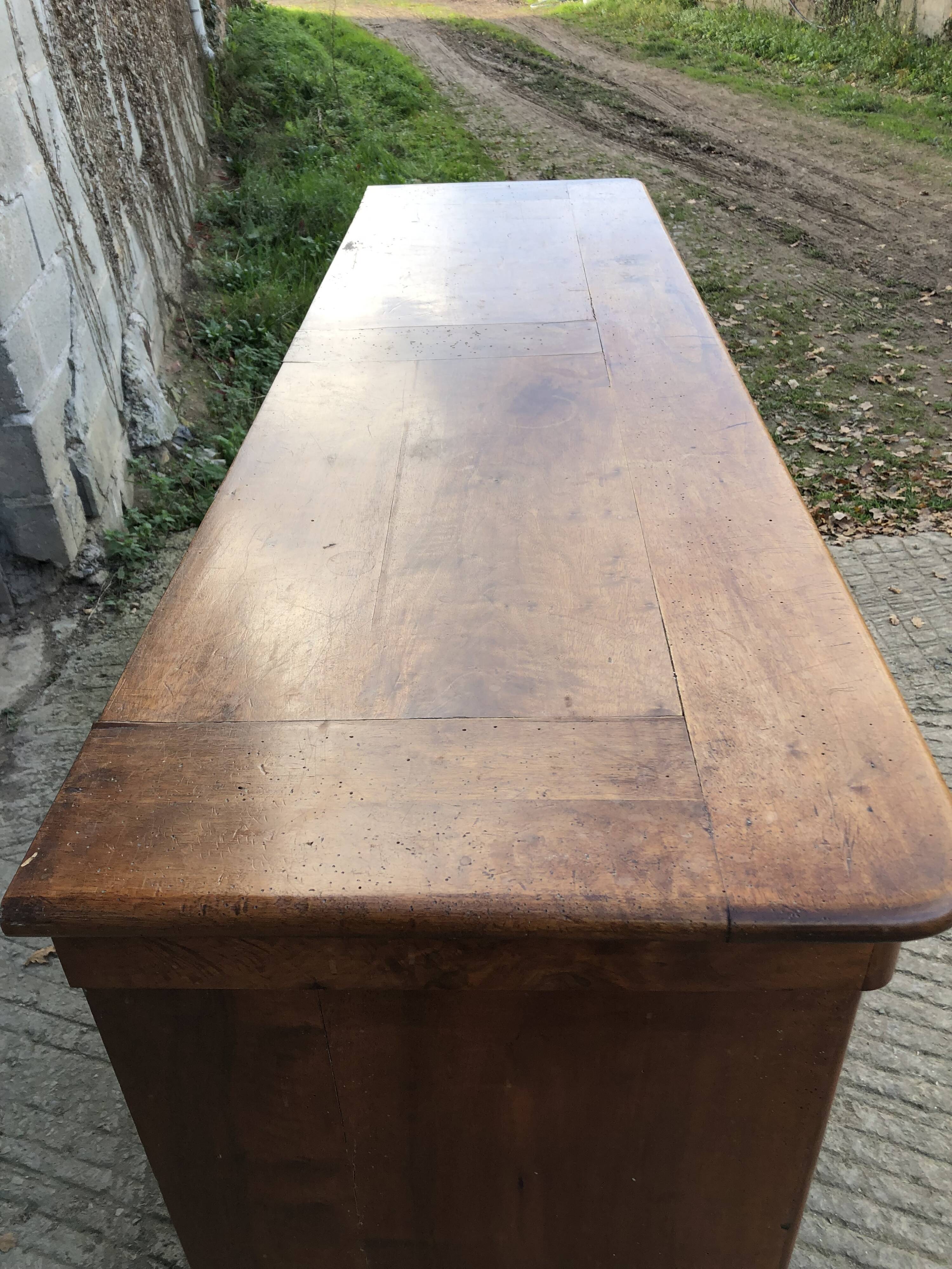 Louis Philippe style sideboard in solid walnut with 3 doors and 1 pull-out shelf.