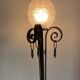 Large art deco floor lamp in wrought iron and white pressed molded glass (height 211 cm)
