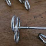Set of 12 silver Cailar-Bayard knife rests