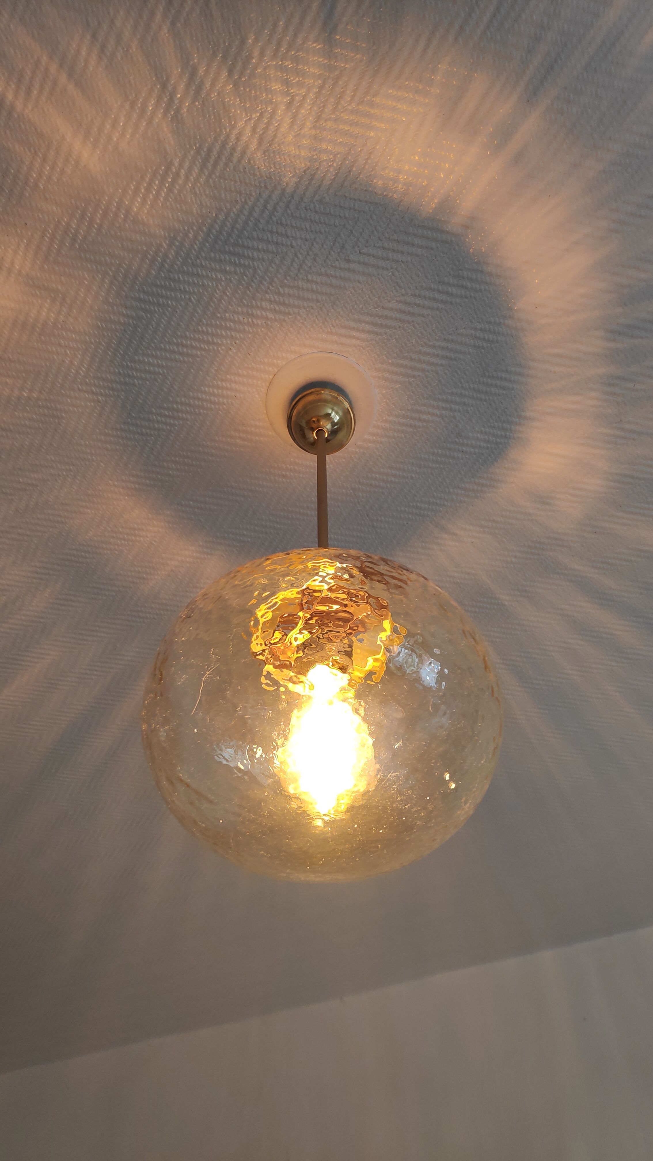 Vintage suspension globe in amber glass