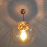 Vintage suspension globe in amber glass