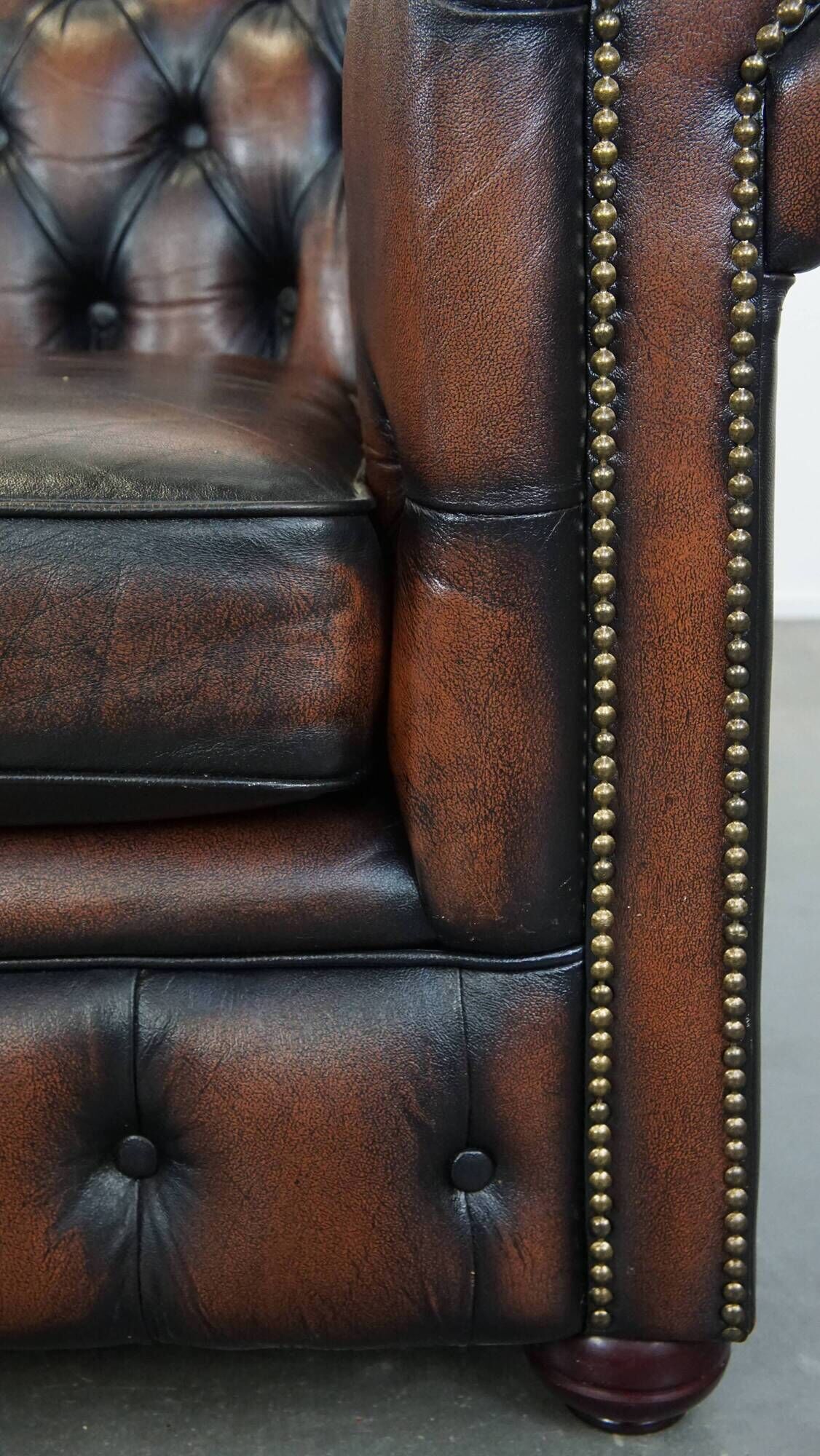 Classic English Chesterfield 2.5 seater sofa in brown cowhide