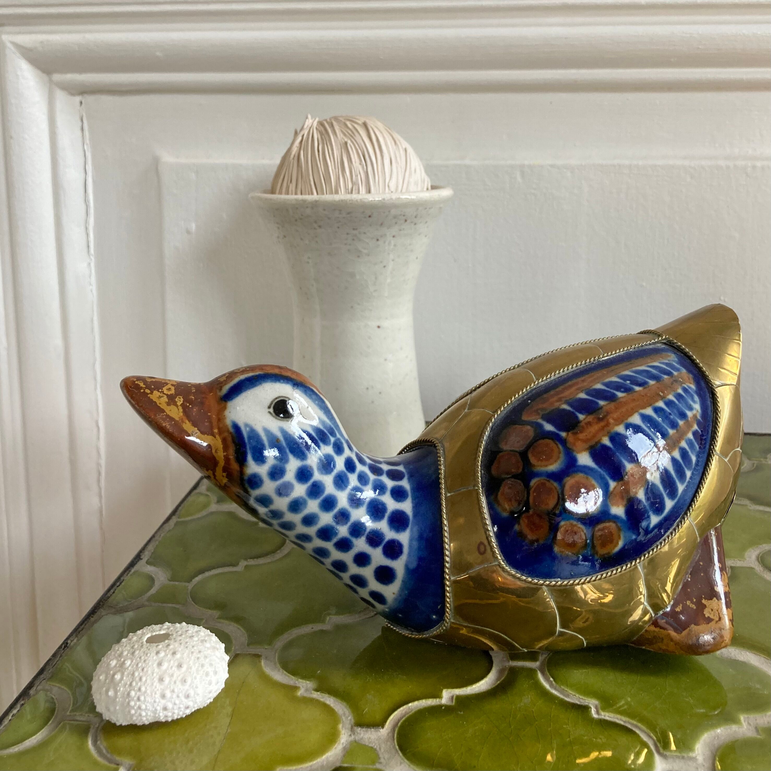 Brass duck and ceramic