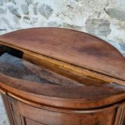 Antique demi-lune cabinet in walnut, late 18th century, French château.