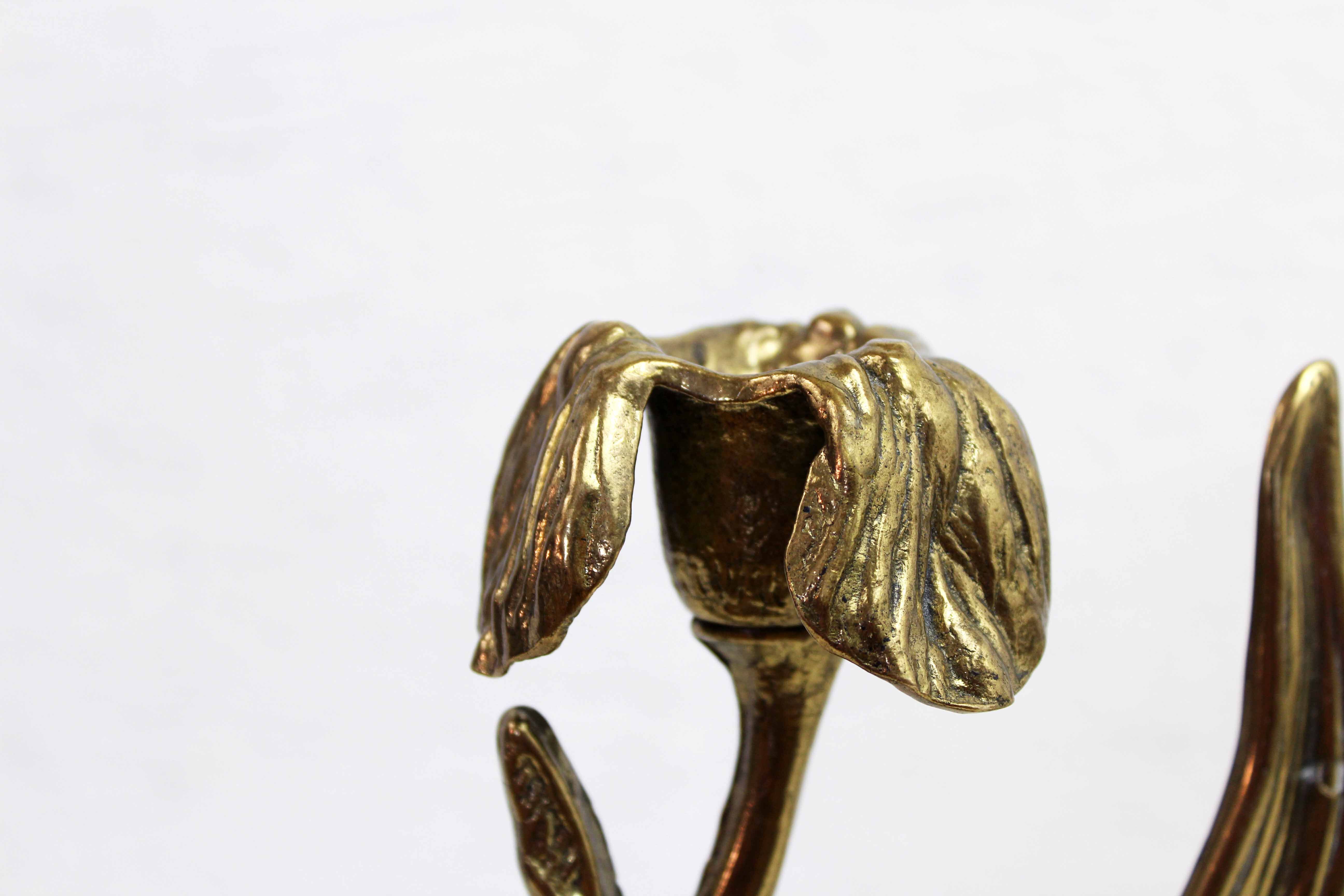 Art Nouveau brass flower candle holder