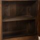 Antique chest of drawers with curved silhouette and patina