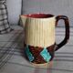 Vase vintage en barbotine en forme de pichet