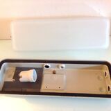 Rectangular porthole wall light in industrial/70s style frosted glass
