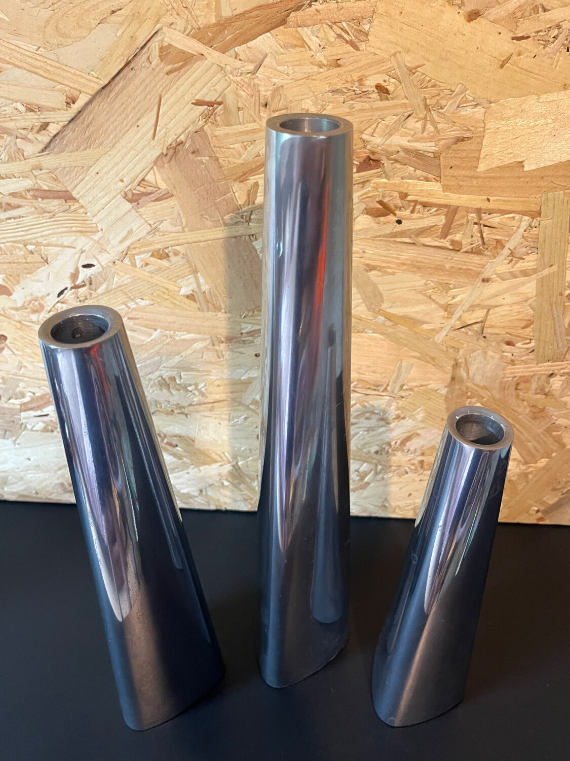 Trio of aluminum candle holders year 90