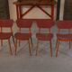 Ensemble de 4 chaises design chêne et skaï rouge 1960's