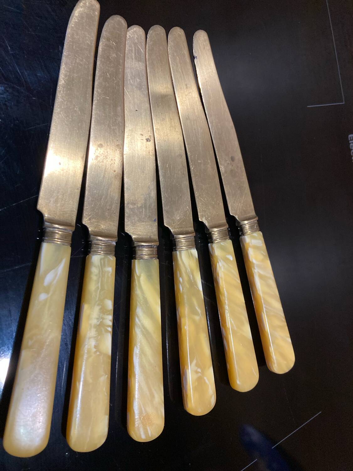 Yellow Bakelite dessert knives