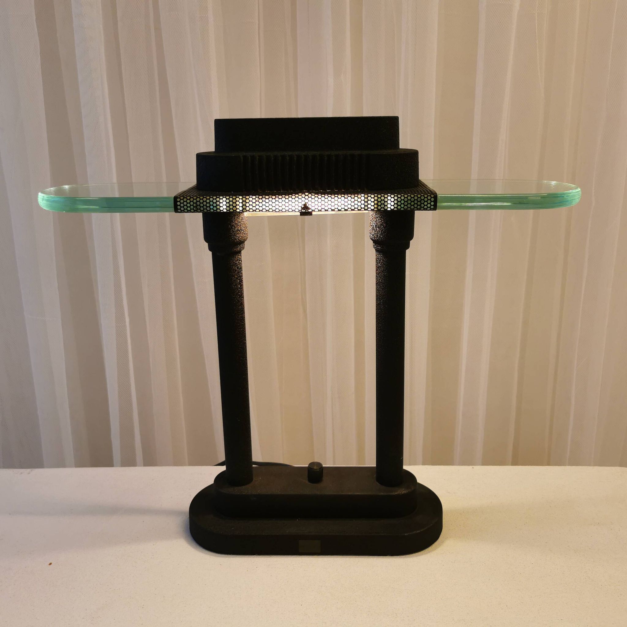 Desk lamp by “Robert Senneman”