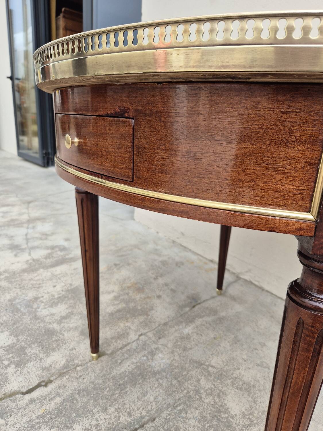 Louis XVI style mahogany bouillotte table in marquetry and bronze