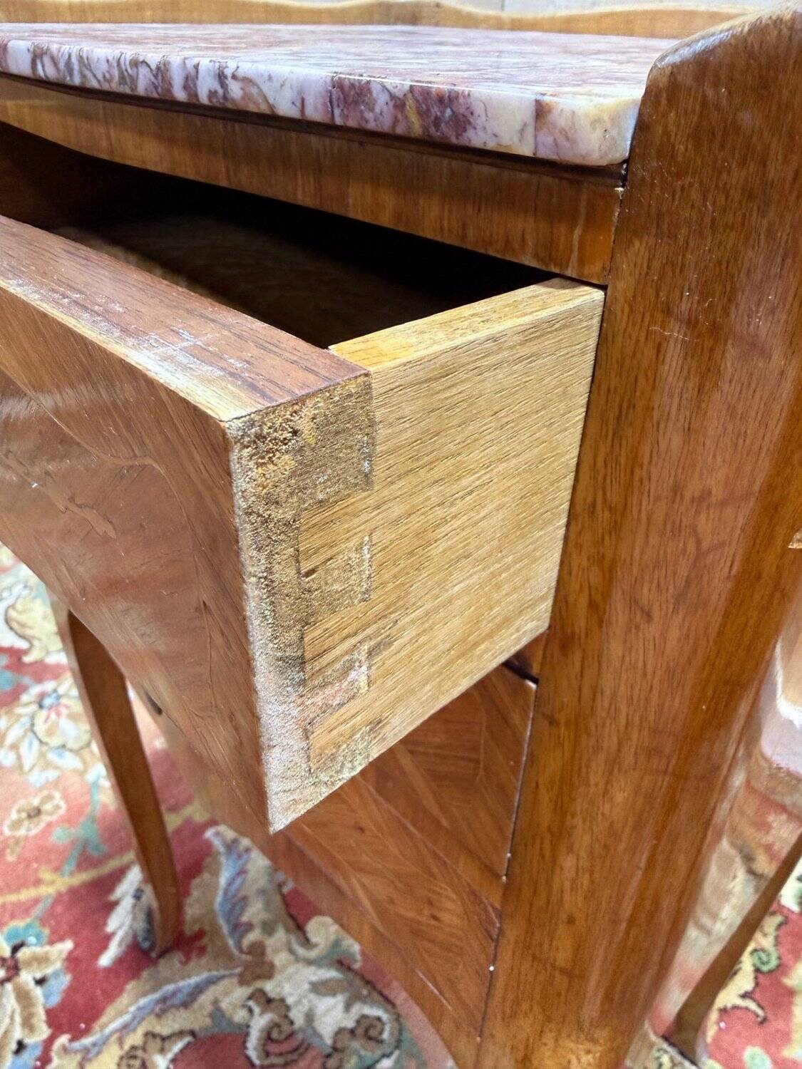 Pair of Louis XV style bedside tables in marquetry.