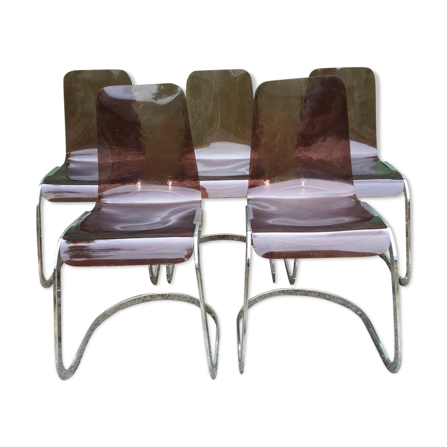 Chairs in plexiglas with chrome metal base