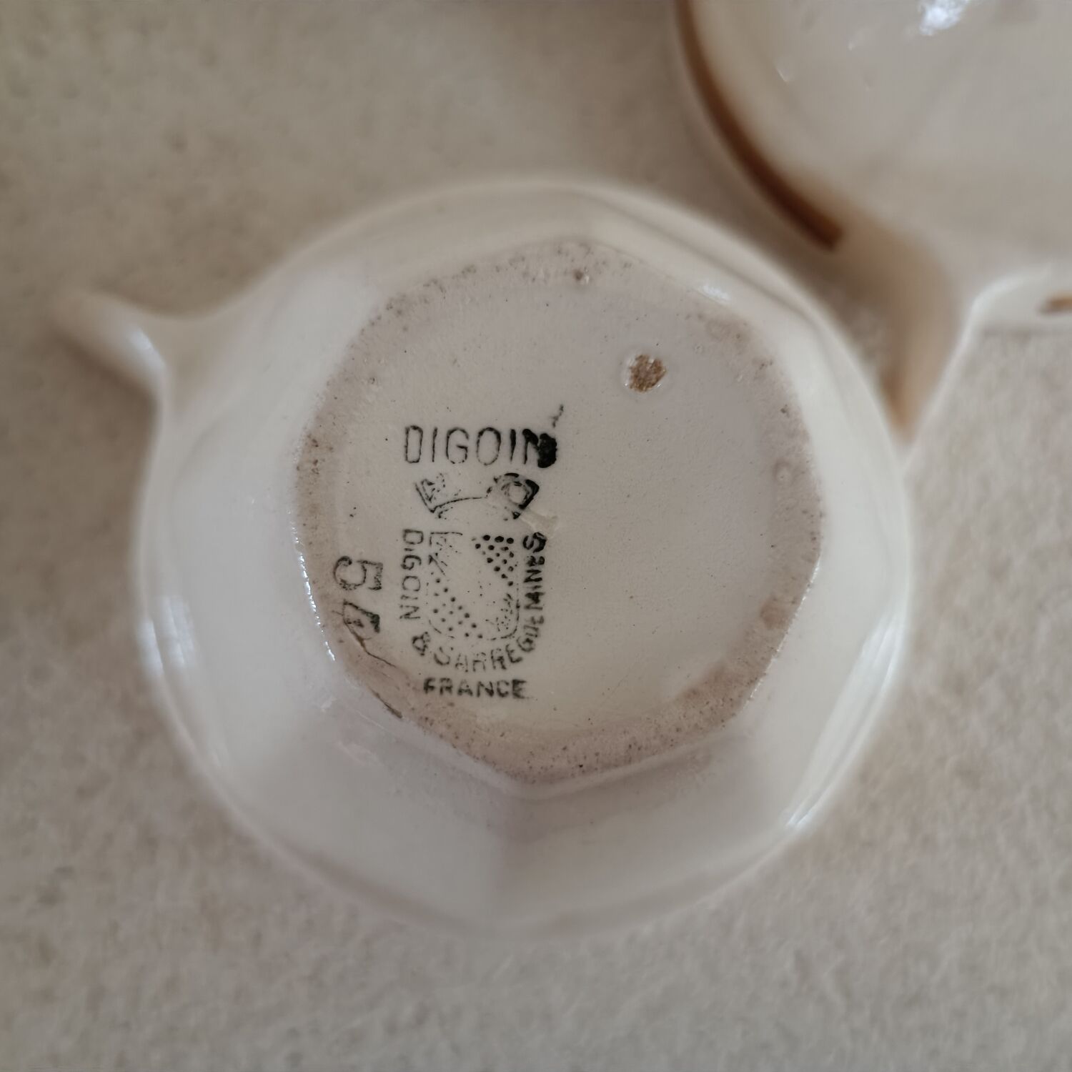 Set of five Digoin Sarreguemines cups