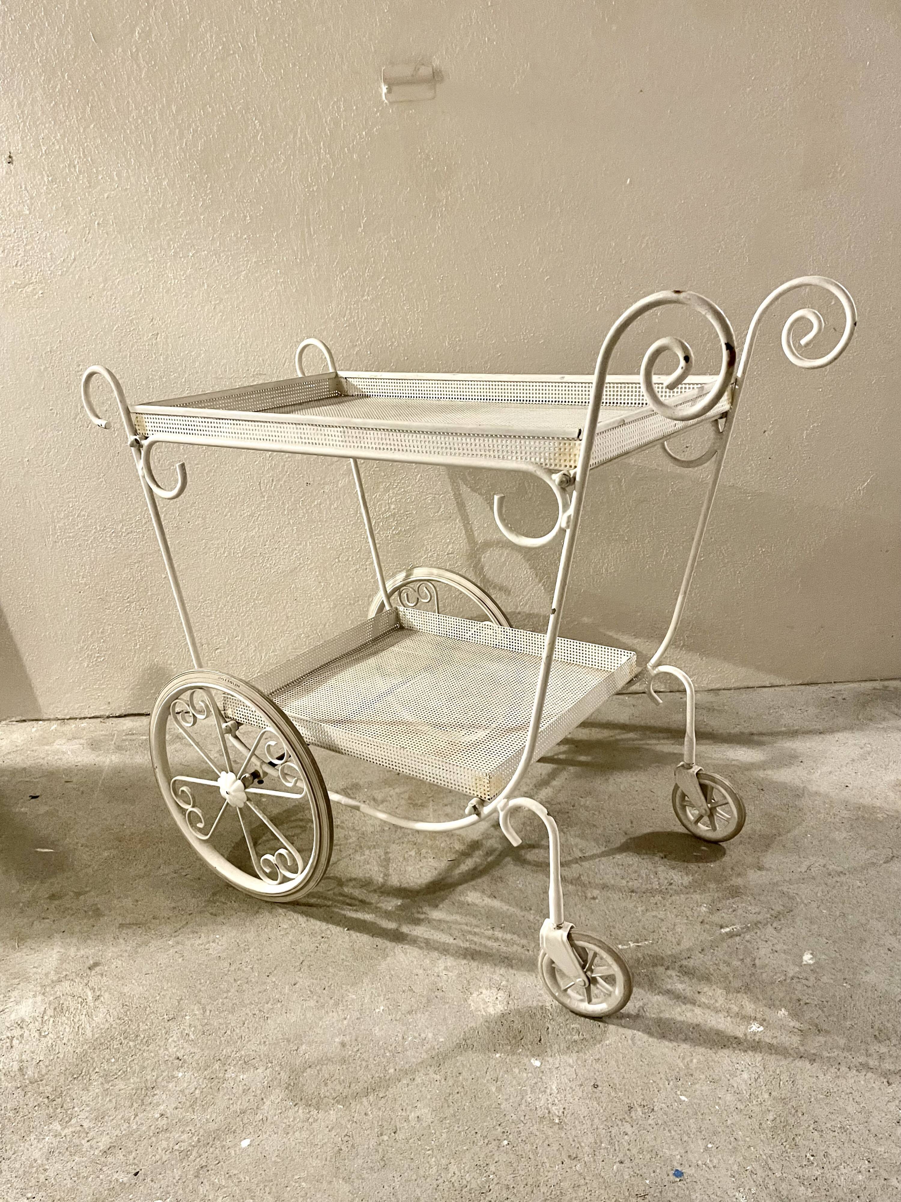 White perforated metal trolley