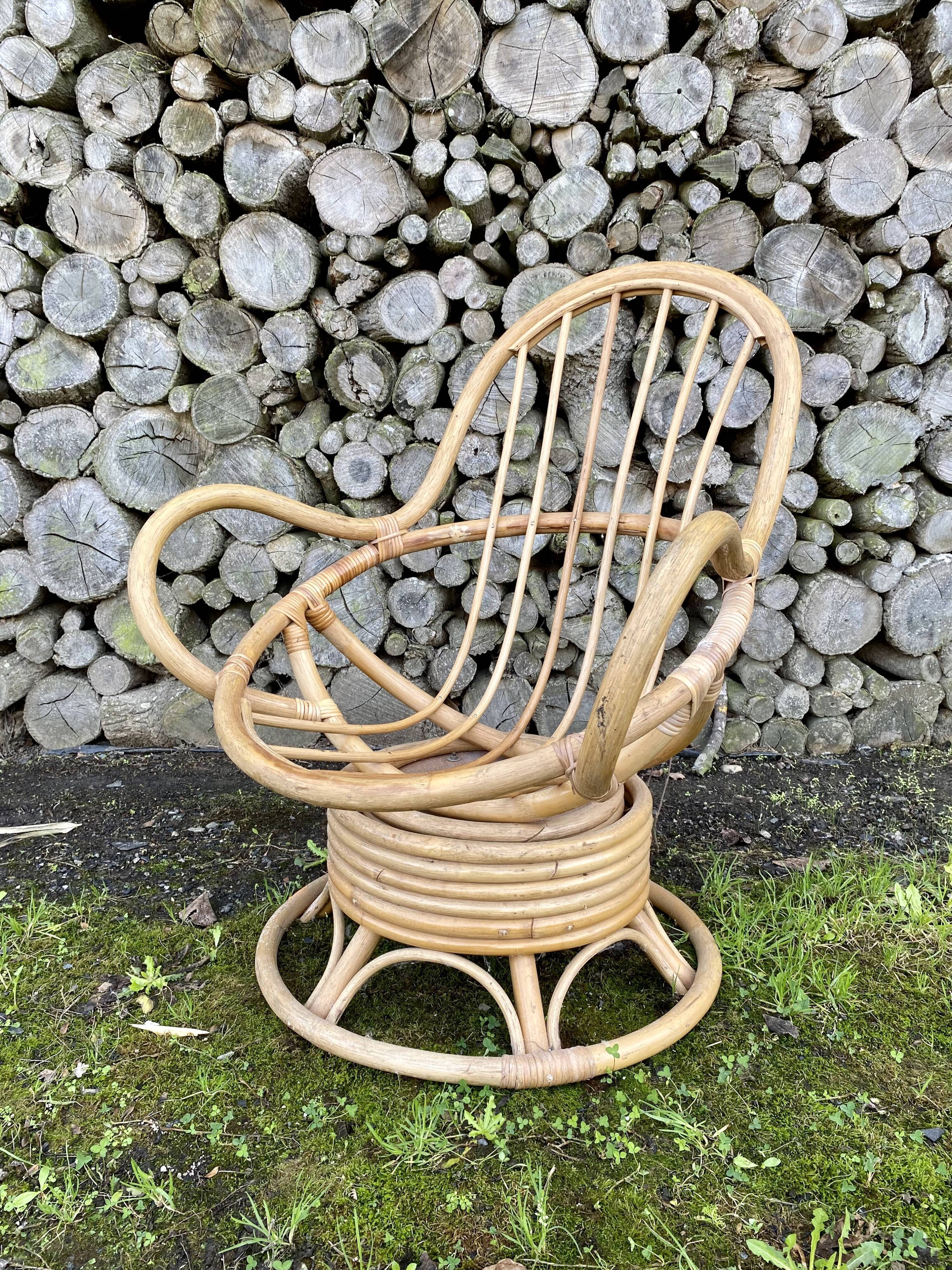 Swivel rattan armchair