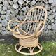 Swivel rattan armchair