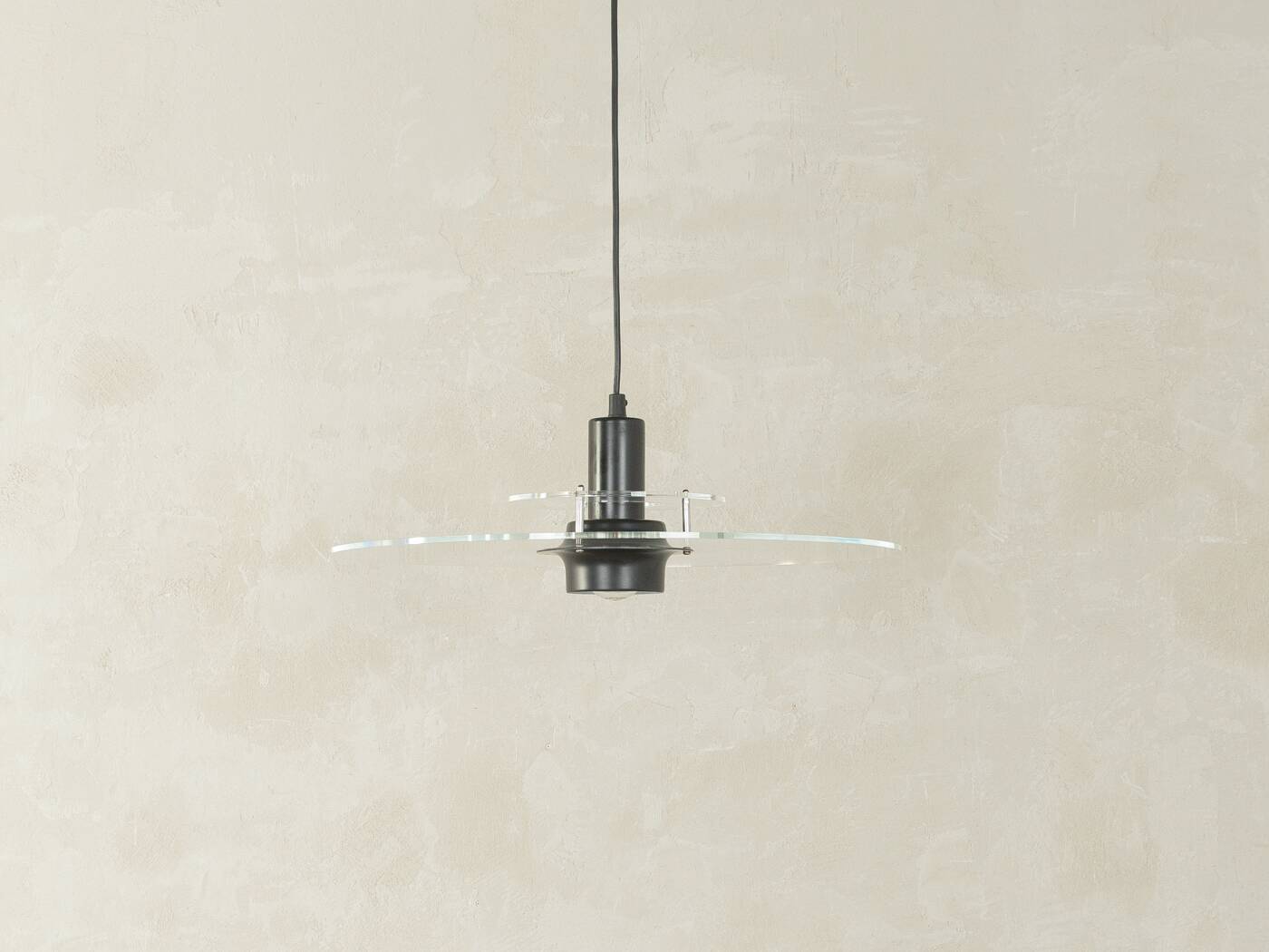 Space Age ceiling lamp by Ikea from the 1980s with two plexiglass plates and canopy made of black injection-moulded plastic.