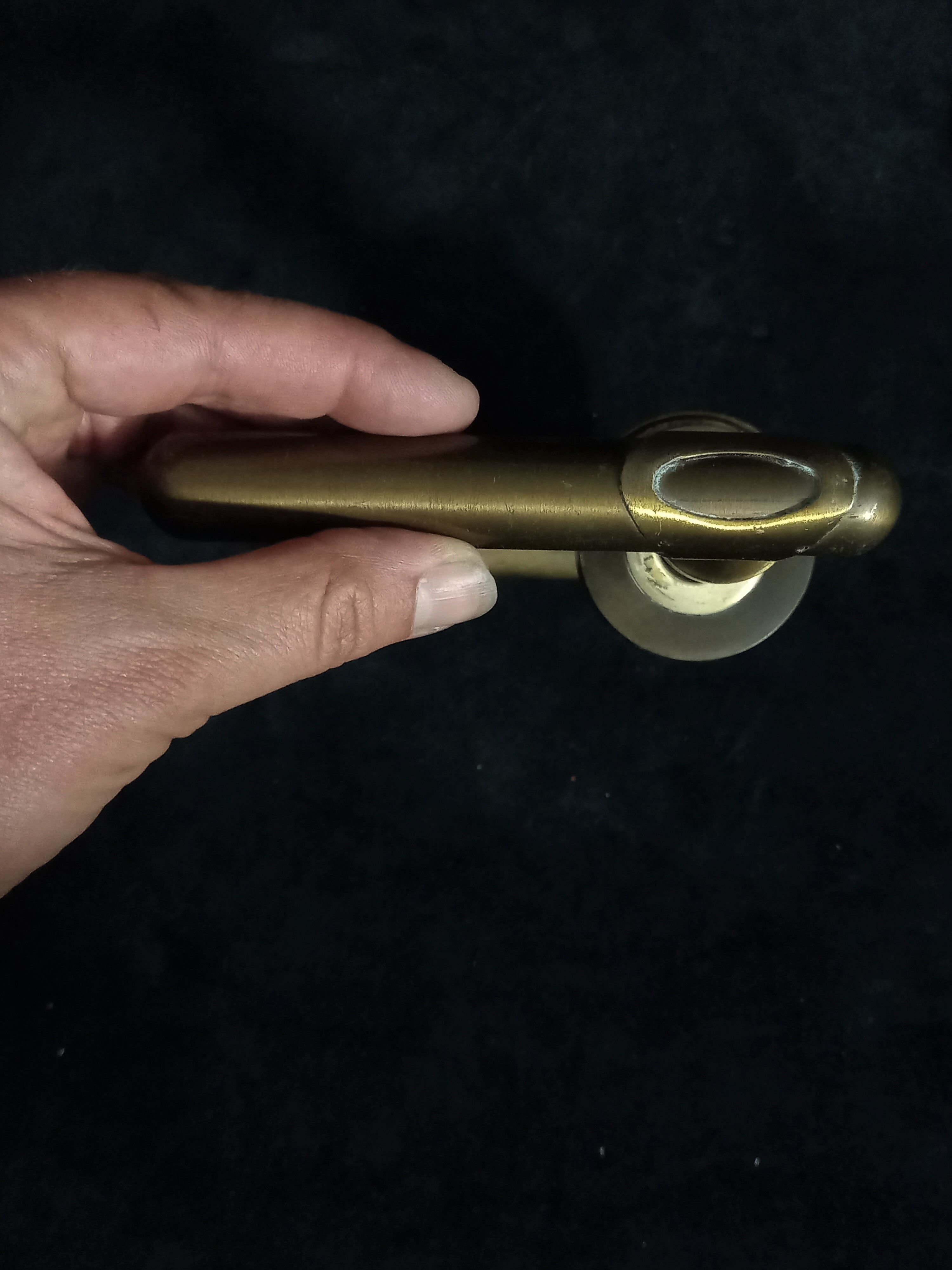 Four pairs of brass door handles with key plates