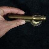 Four pairs of brass door handles with key plates