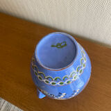 Glazed blue ceramic vase with folk decoration
