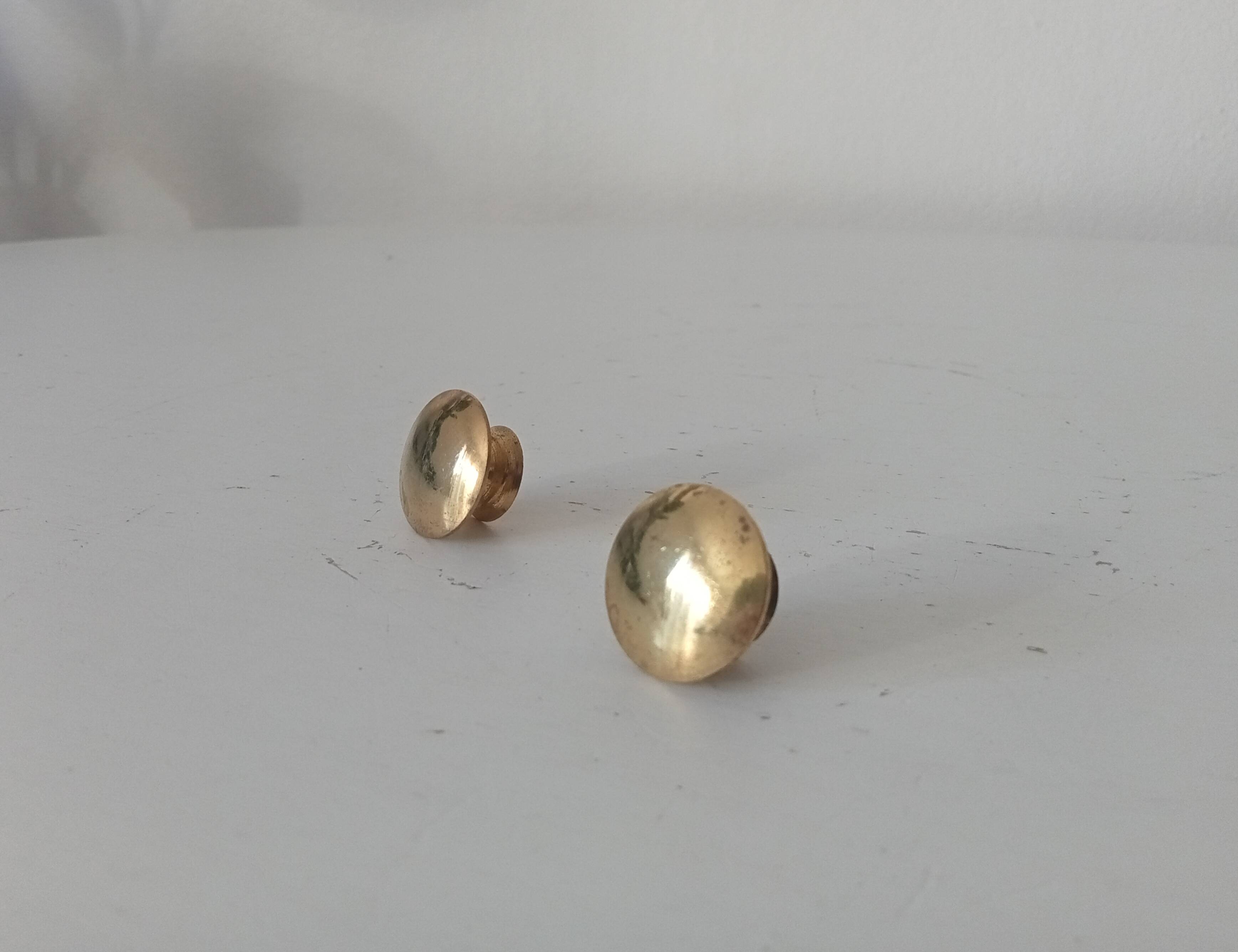 Pair of vintage brass "lens" knobs/furniture handles