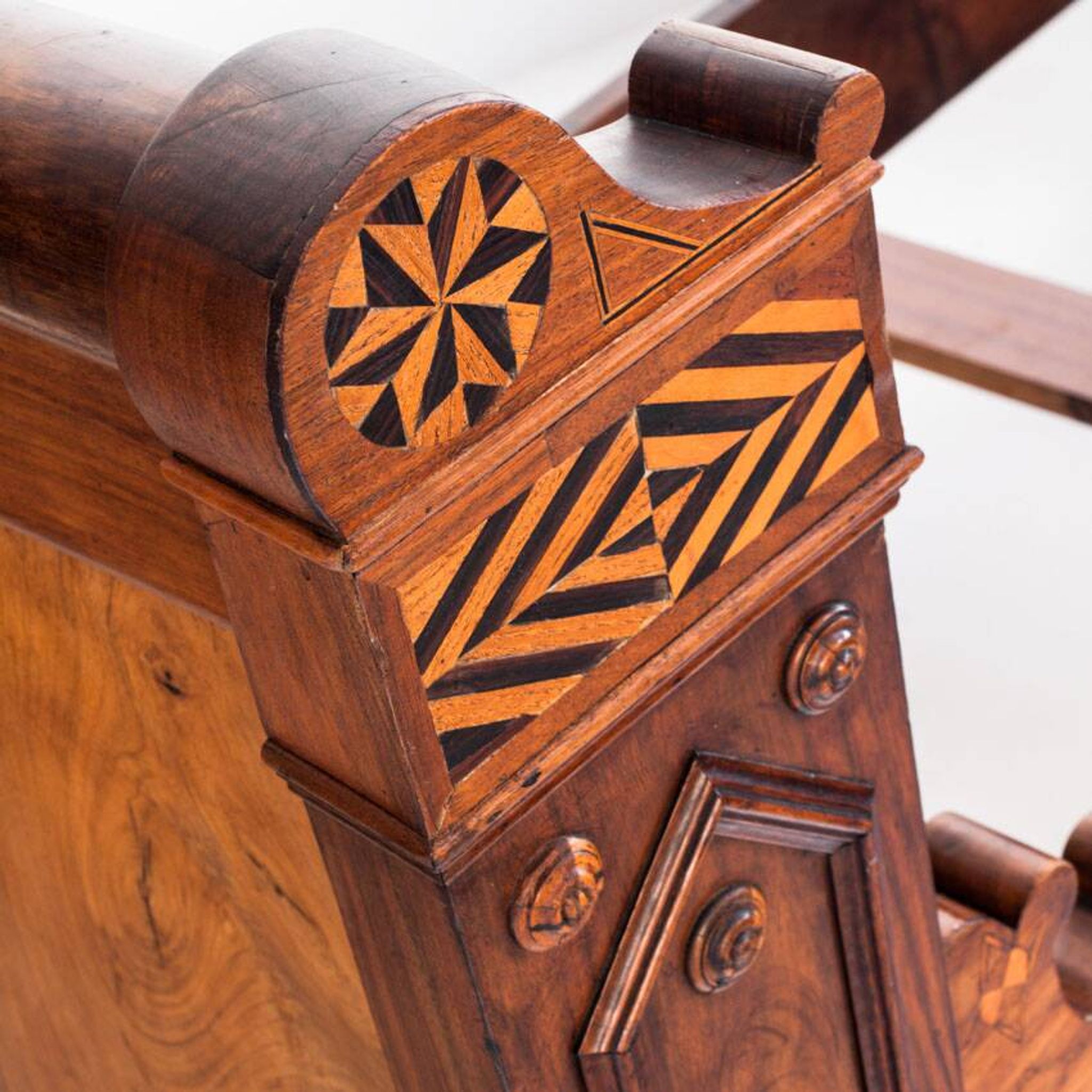 Bed made of solid walnut with marquetry details. France, 1930s.