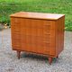 Chest of drawers from the 50s-60s in golden mahogany 4 drawers feet bobbin