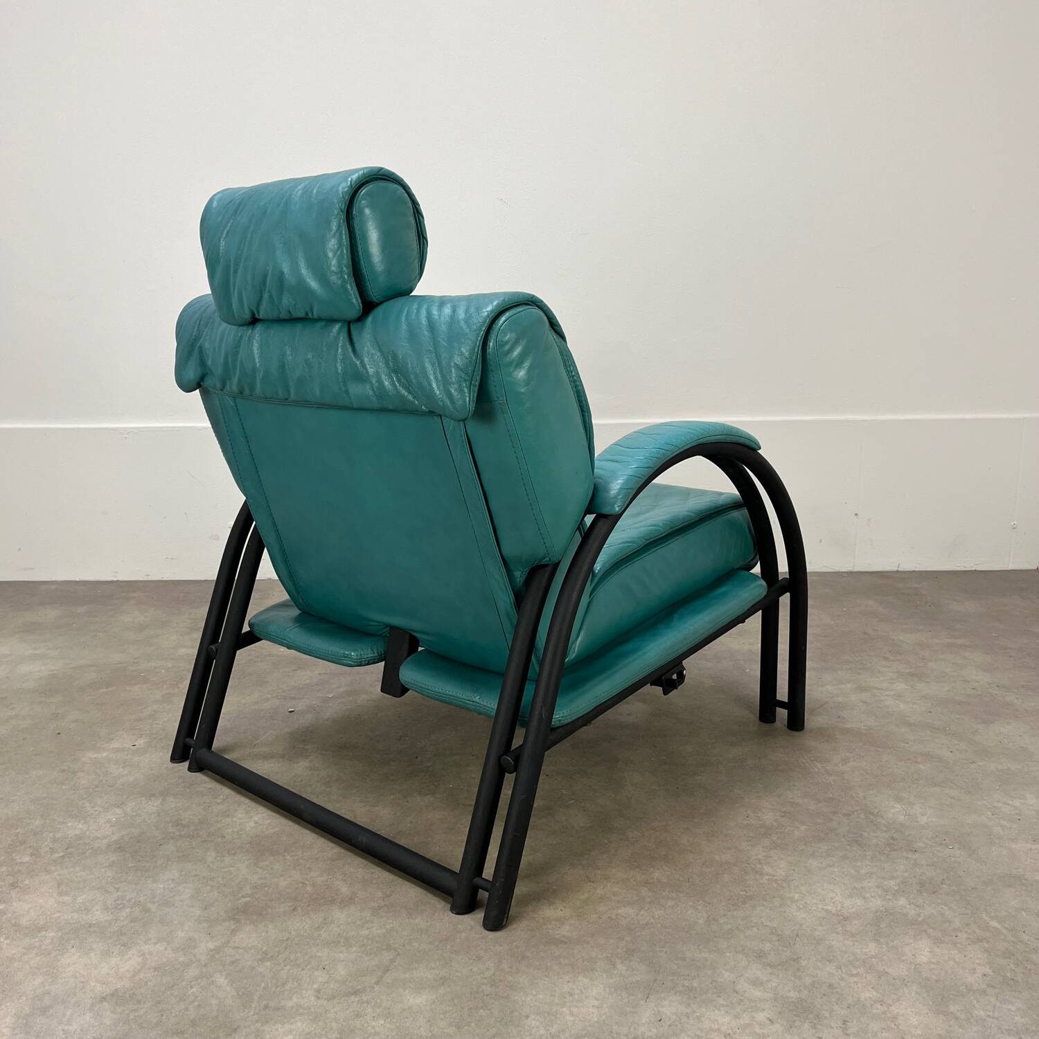 Postmodern design armchair and ottoman, 80s leather