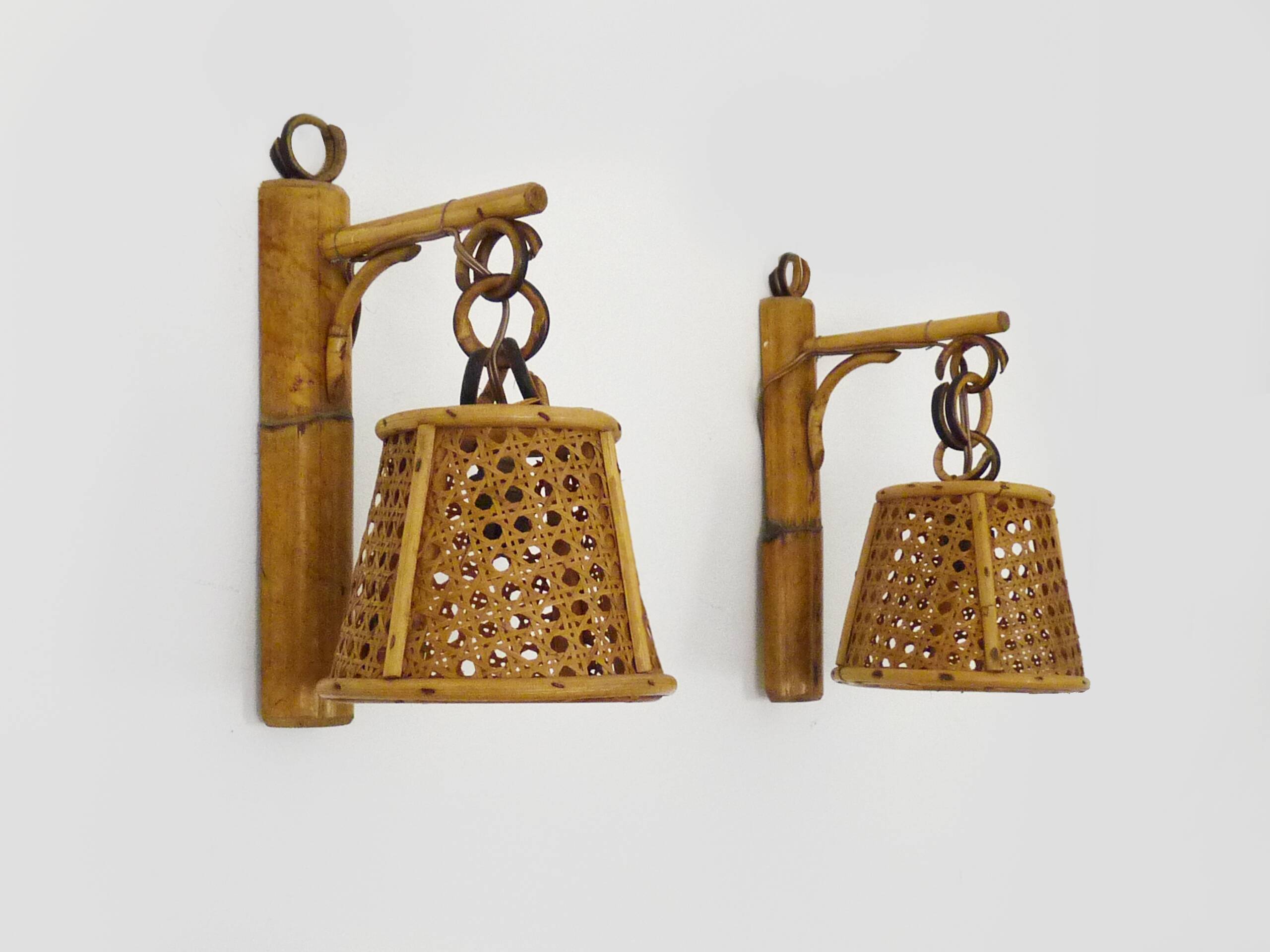 Pair of rattan and cane lantern wall lights. 1950s-60s