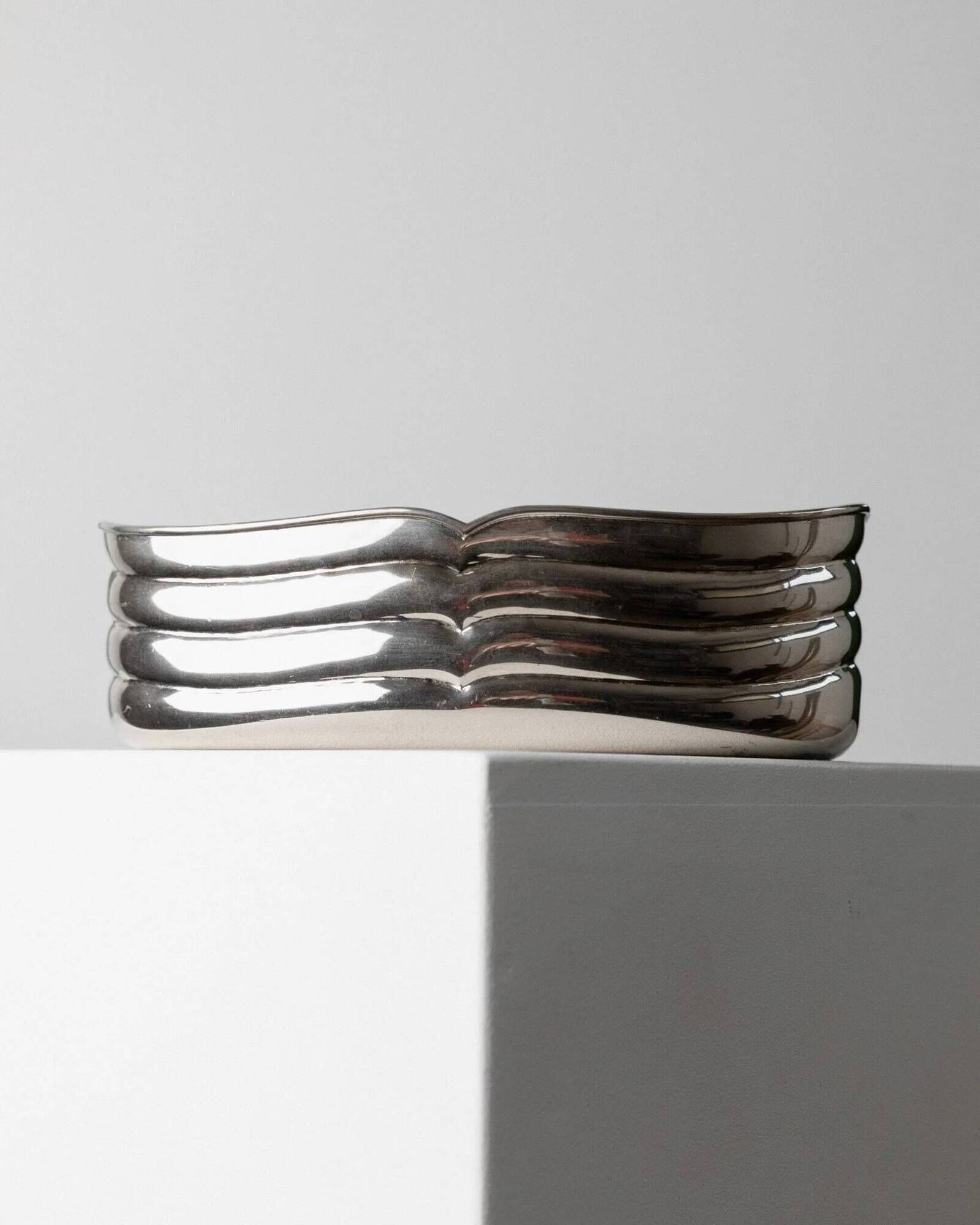 Vintage silver-plated metal bowl with curved relief design, Italy 1960s, elegant appetizer plate