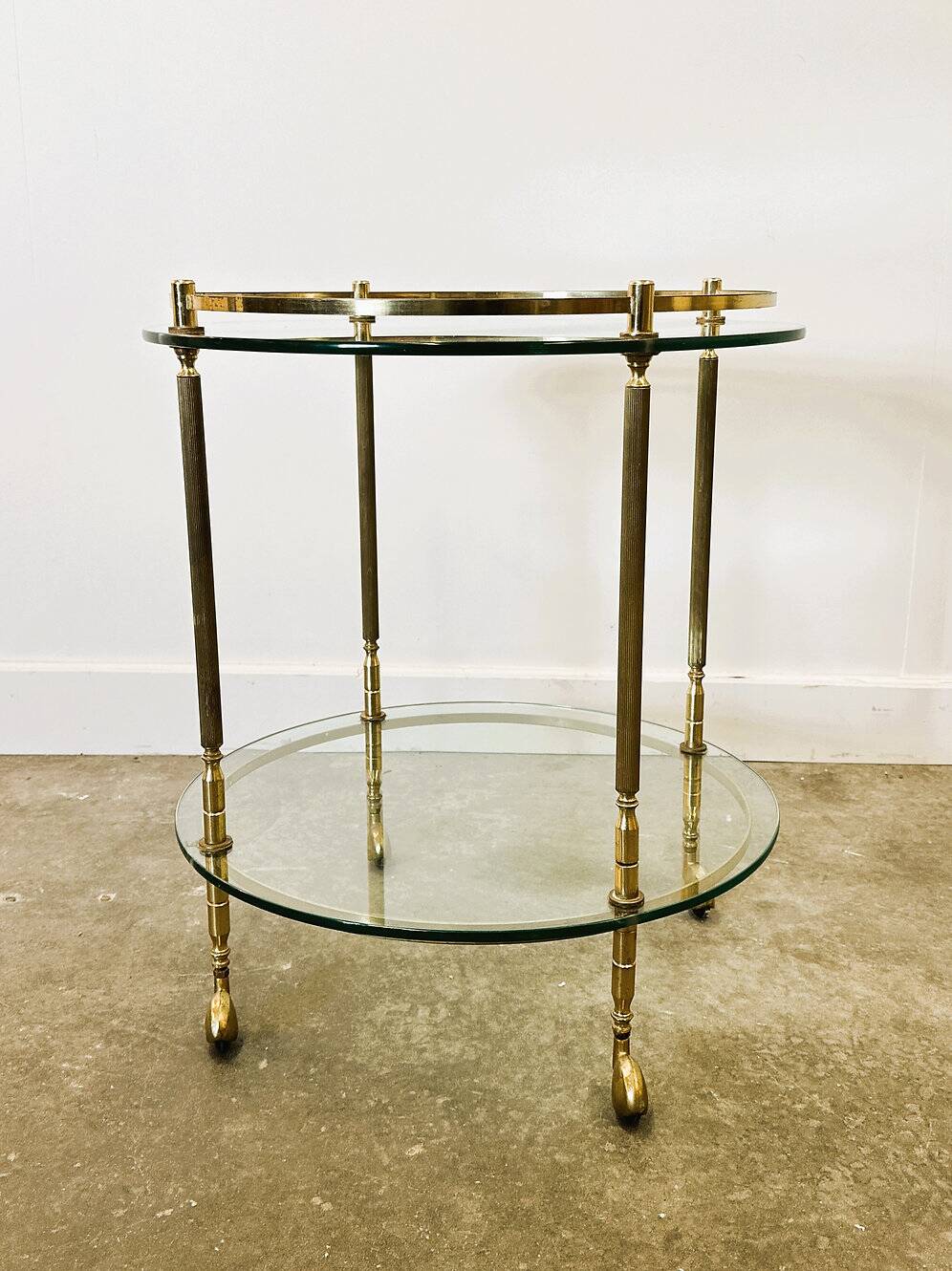 1970s mid-century modern Italian brass and glass round bar cart, Italy.